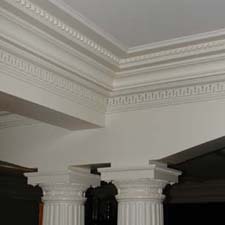 decorative capitals with surrounding millwork