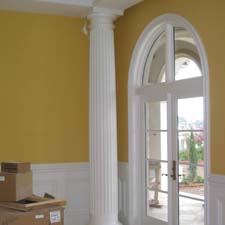 fluted decorative columns with a wainscot system
